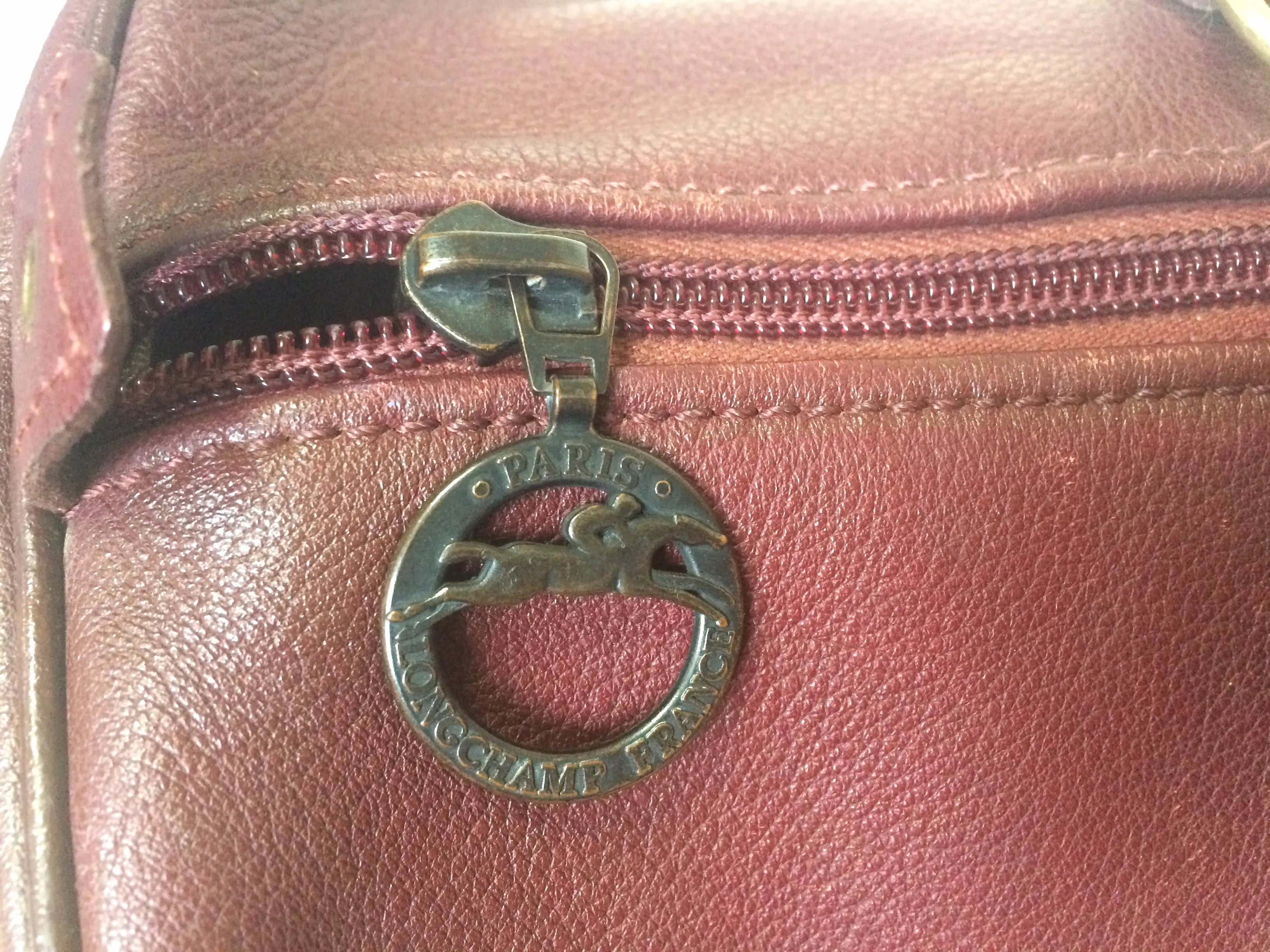 80's Vintage Longchamp rare dark wine leather duffle bag, mini travel purse. Classic bag for unisex use.