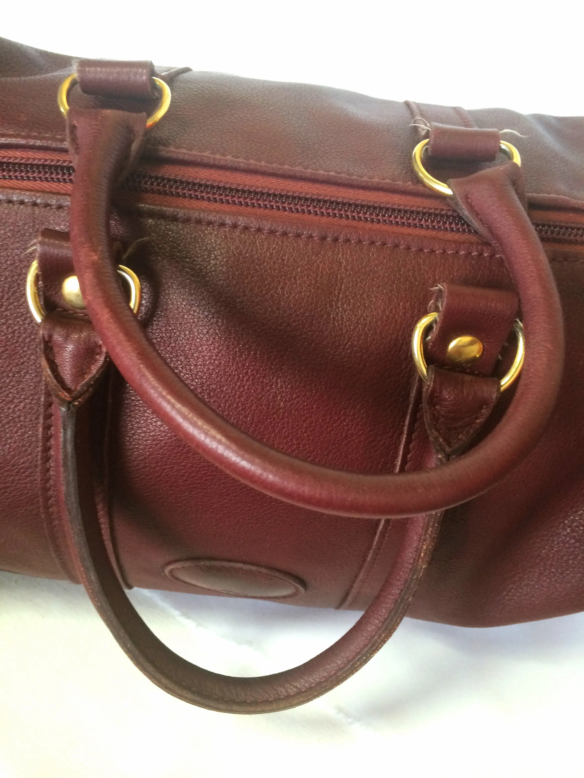 80's Vintage Longchamp rare dark wine leather duffle bag, mini travel purse. Classic bag for unisex use.
