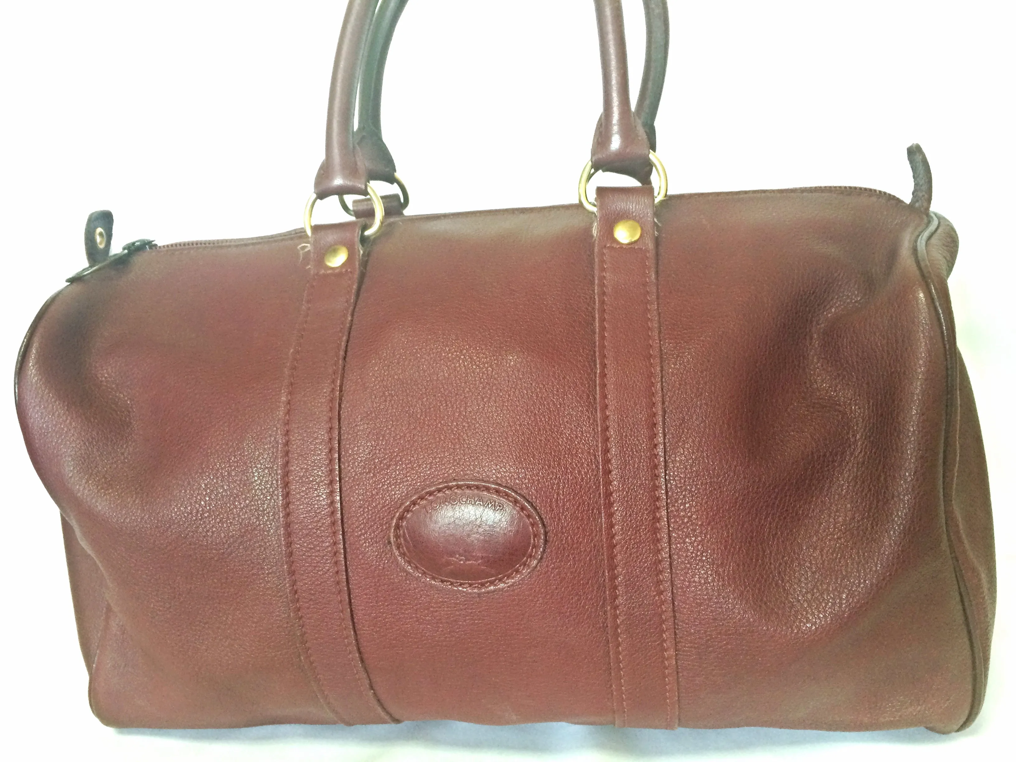 80's Vintage Longchamp rare dark wine leather duffle bag, mini travel purse. Classic bag for unisex use.