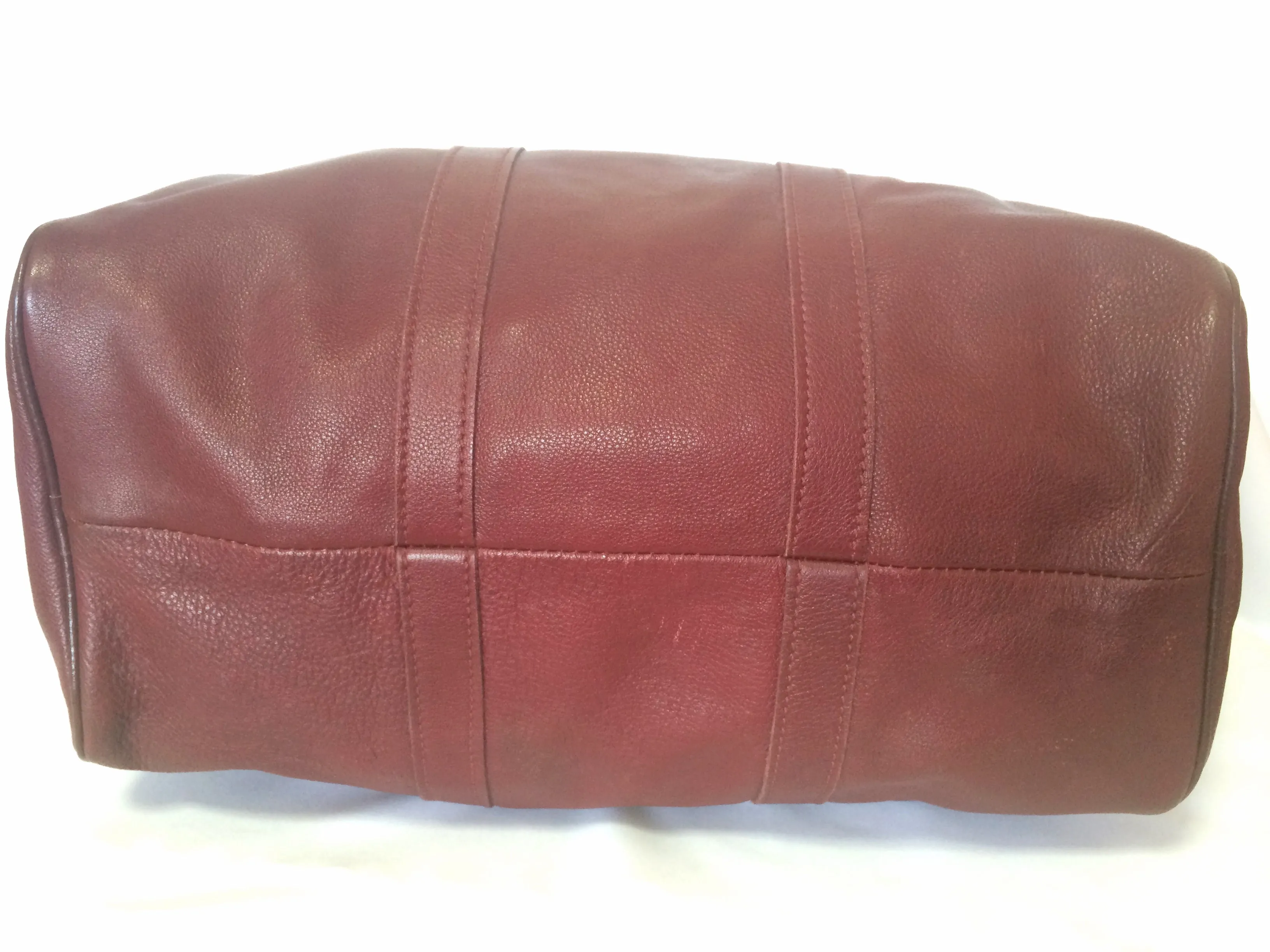 80's Vintage Longchamp rare dark wine leather duffle bag, mini travel purse. Classic bag for unisex use.