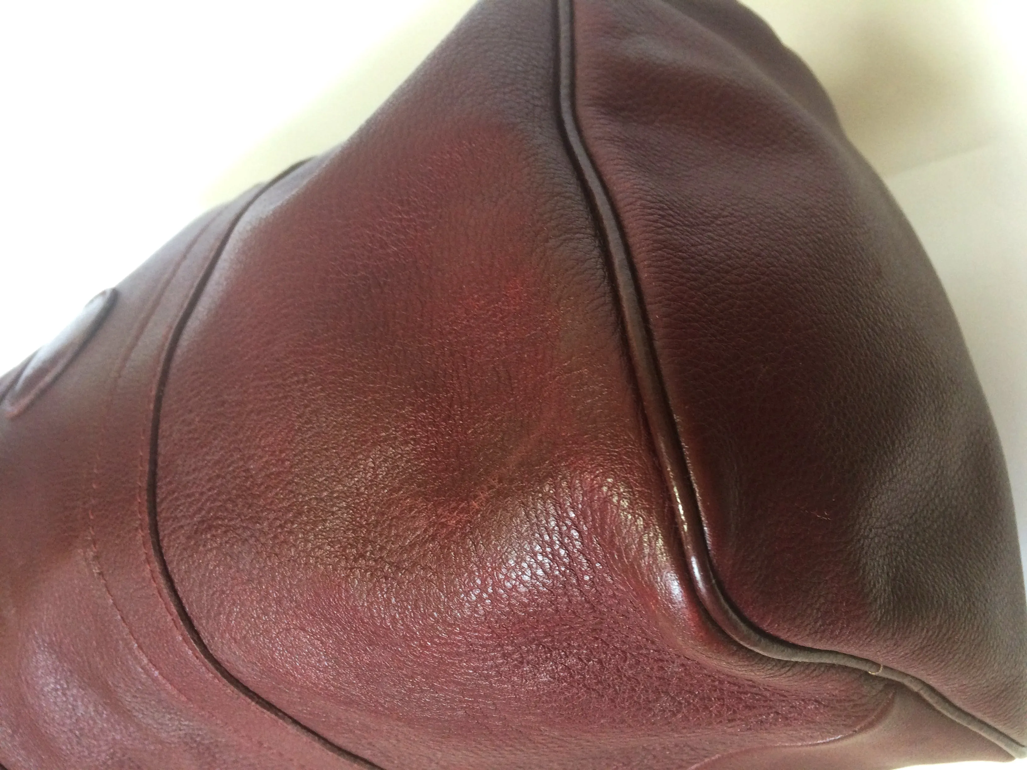 80's Vintage Longchamp rare dark wine leather duffle bag, mini travel purse. Classic bag for unisex use.