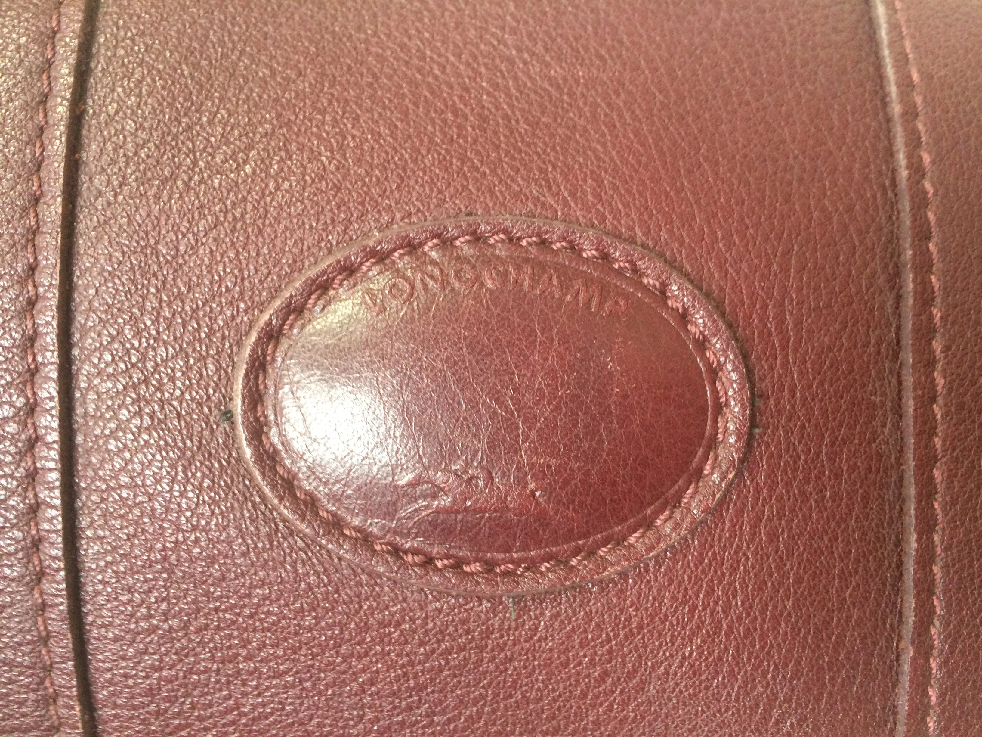 80's Vintage Longchamp rare dark wine leather duffle bag, mini travel purse. Classic bag for unisex use.