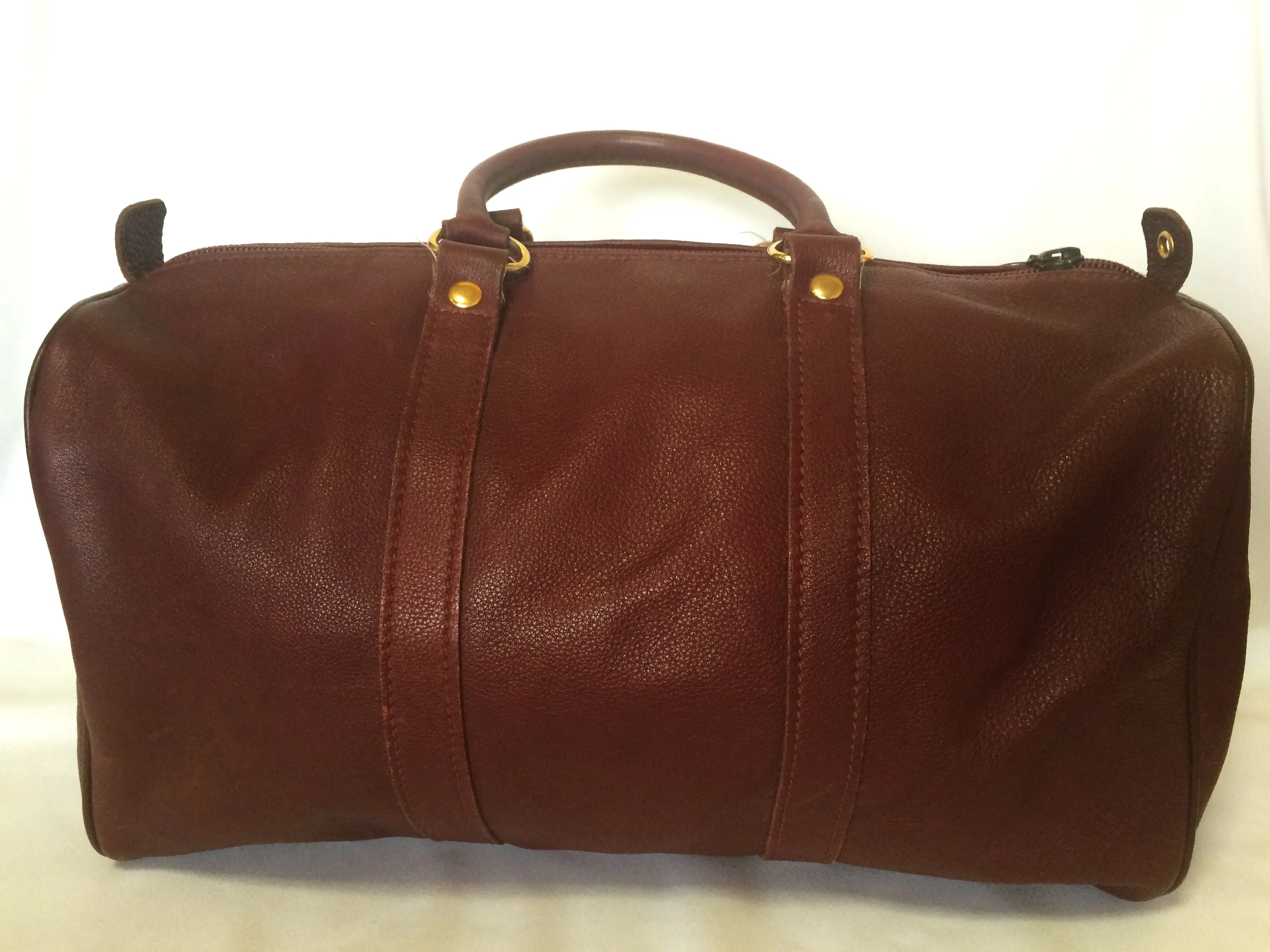 80's Vintage Longchamp rare dark wine leather duffle bag, mini travel purse. Classic bag for unisex use.