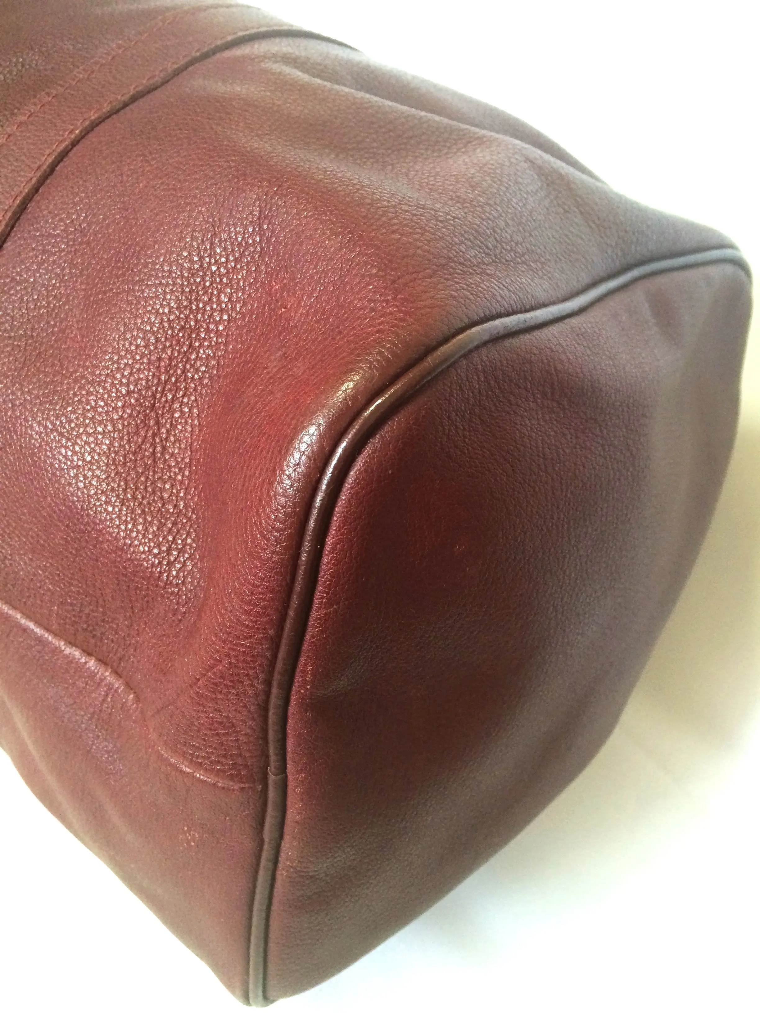 80's Vintage Longchamp rare dark wine leather duffle bag, mini travel purse. Classic bag for unisex use.