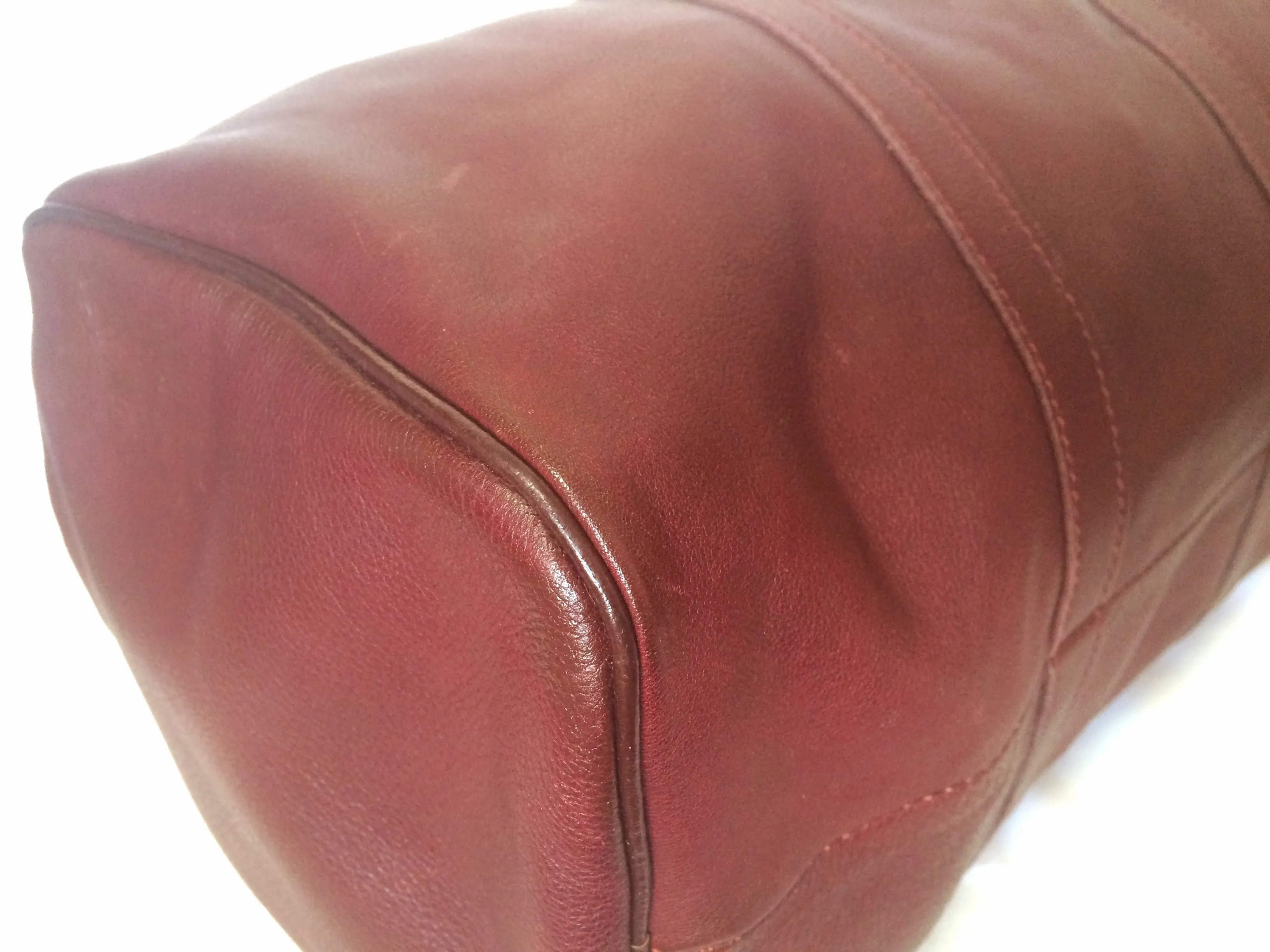 80's Vintage Longchamp rare dark wine leather duffle bag, mini travel purse. Classic bag for unisex use.