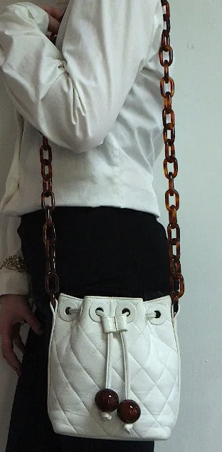 Authentic Chanel White Quilted Tortoise Hardware Drawstring Handbag