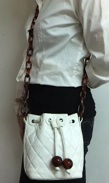 Authentic Chanel White Quilted Tortoise Hardware Drawstring Handbag