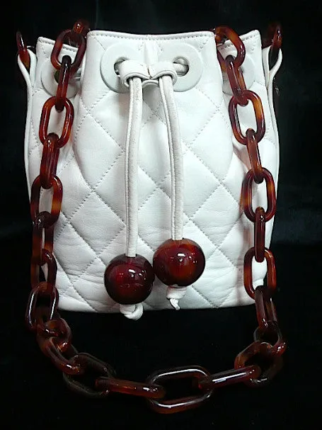 Authentic Chanel White Quilted Tortoise Hardware Drawstring Handbag