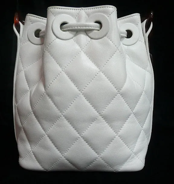 Authentic Chanel White Quilted Tortoise Hardware Drawstring Handbag