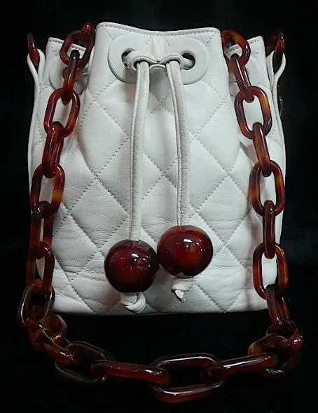 Authentic Chanel White Quilted Tortoise Hardware Drawstring Handbag