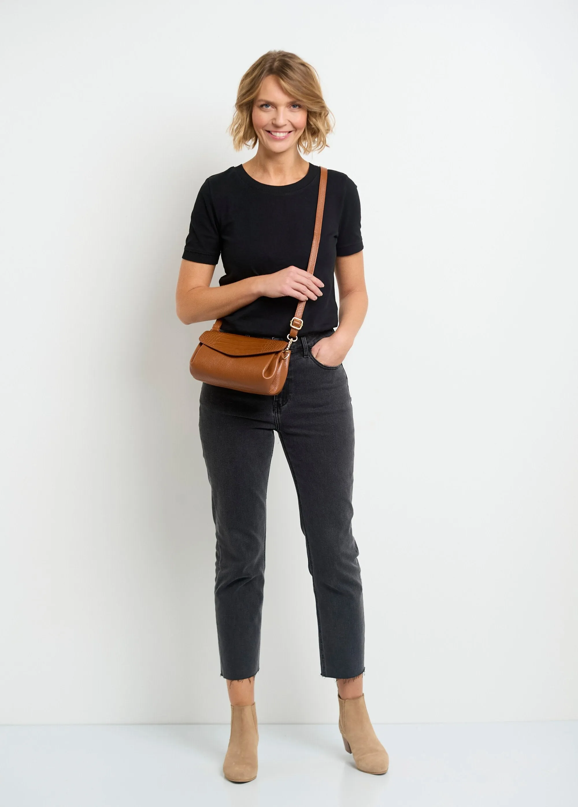Leather handbag with reptile-style flap