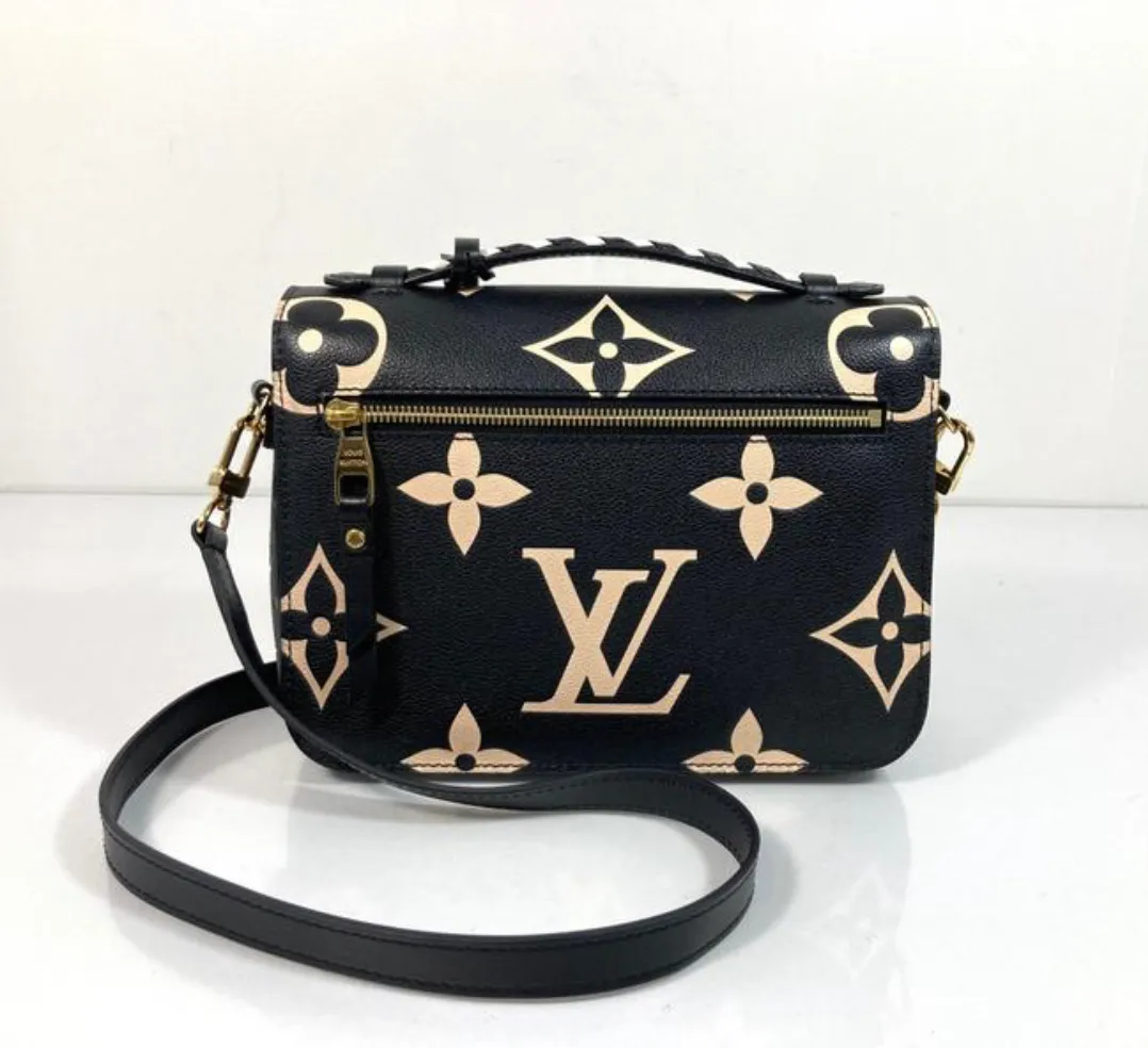 Louis Vuitton Limited Edition Crafty Monogram Metis in Black
