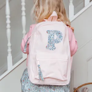 Pale pink initial backpack