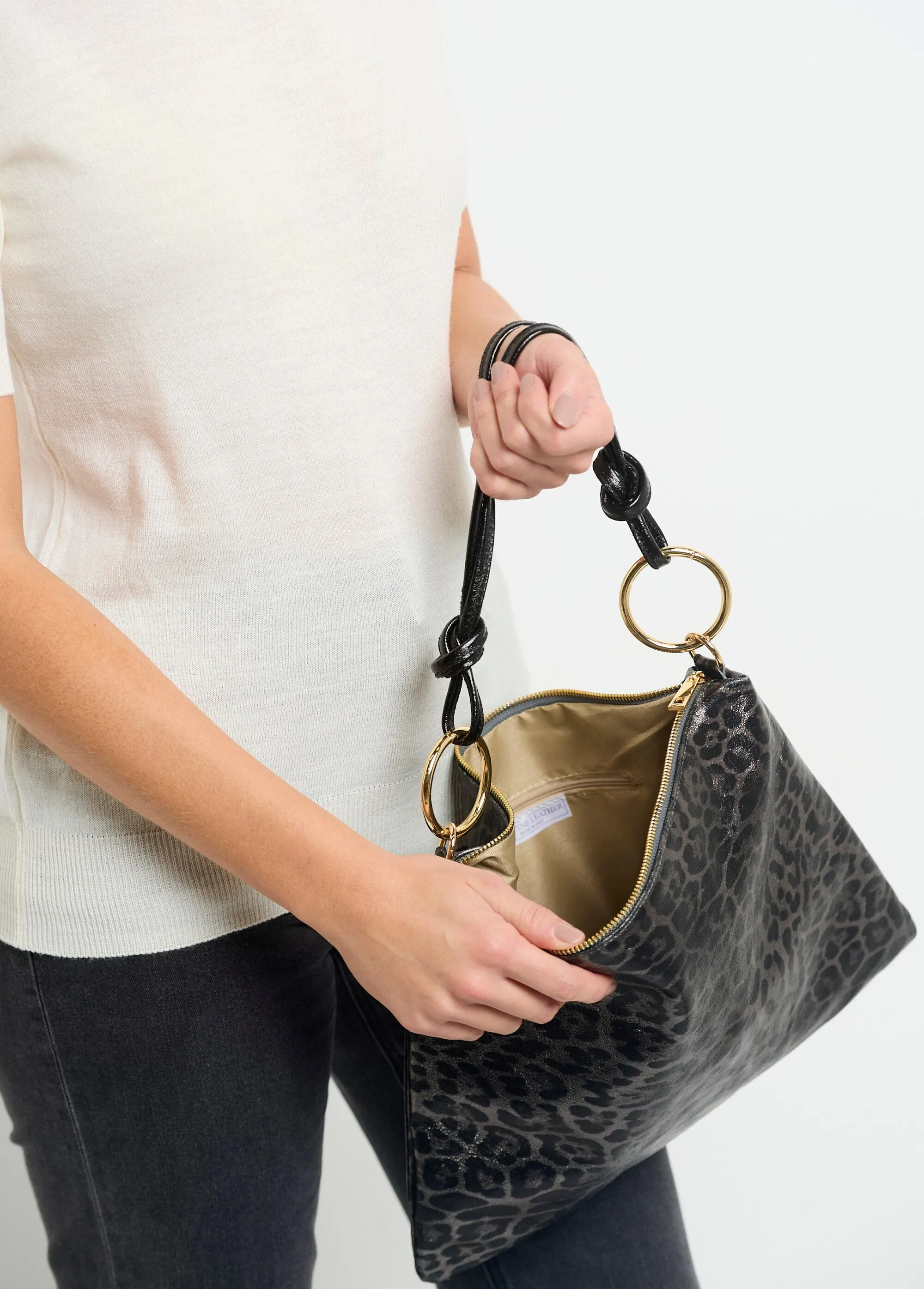 Shiny leopard print leather handbag
