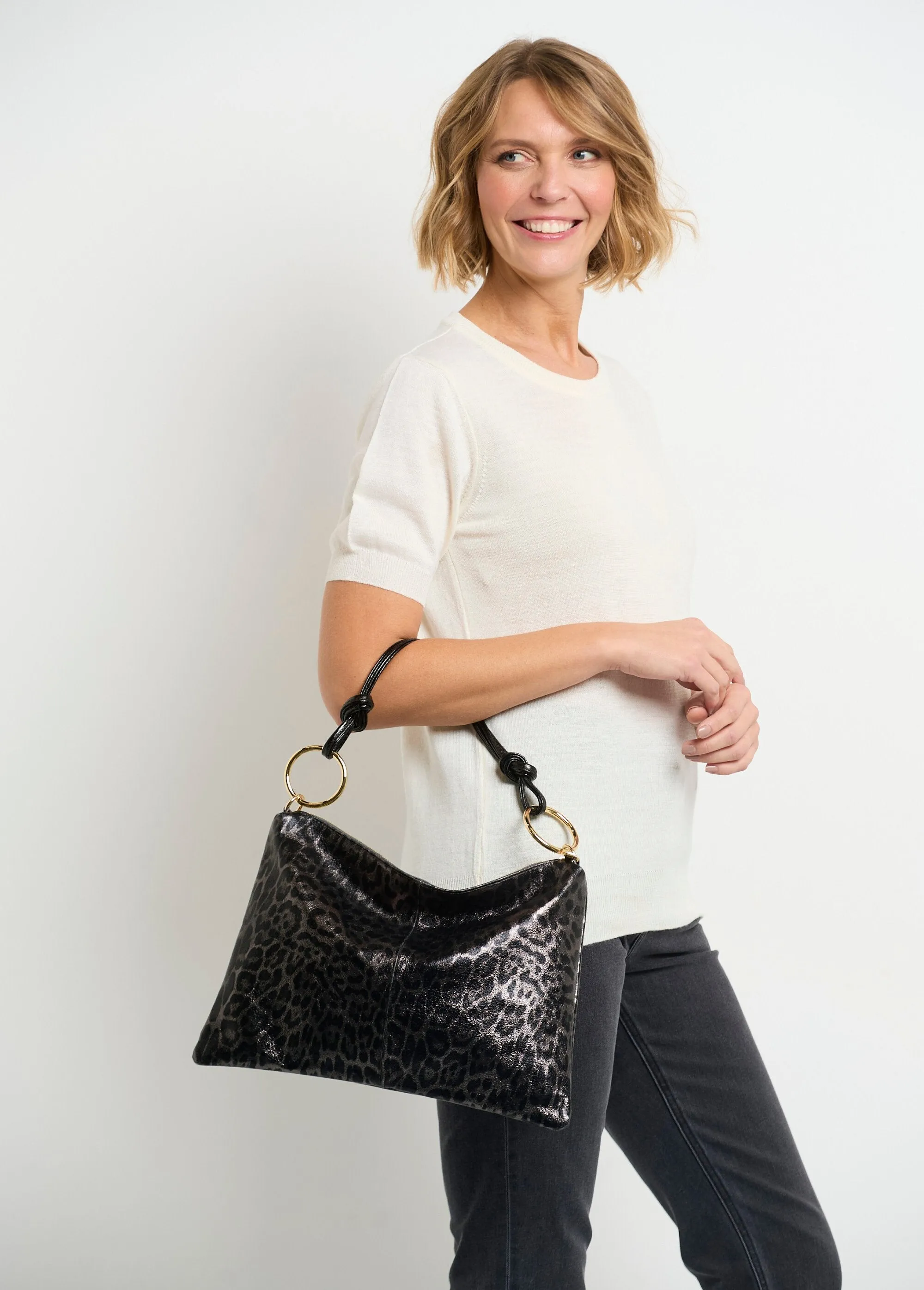Shiny leopard print leather handbag