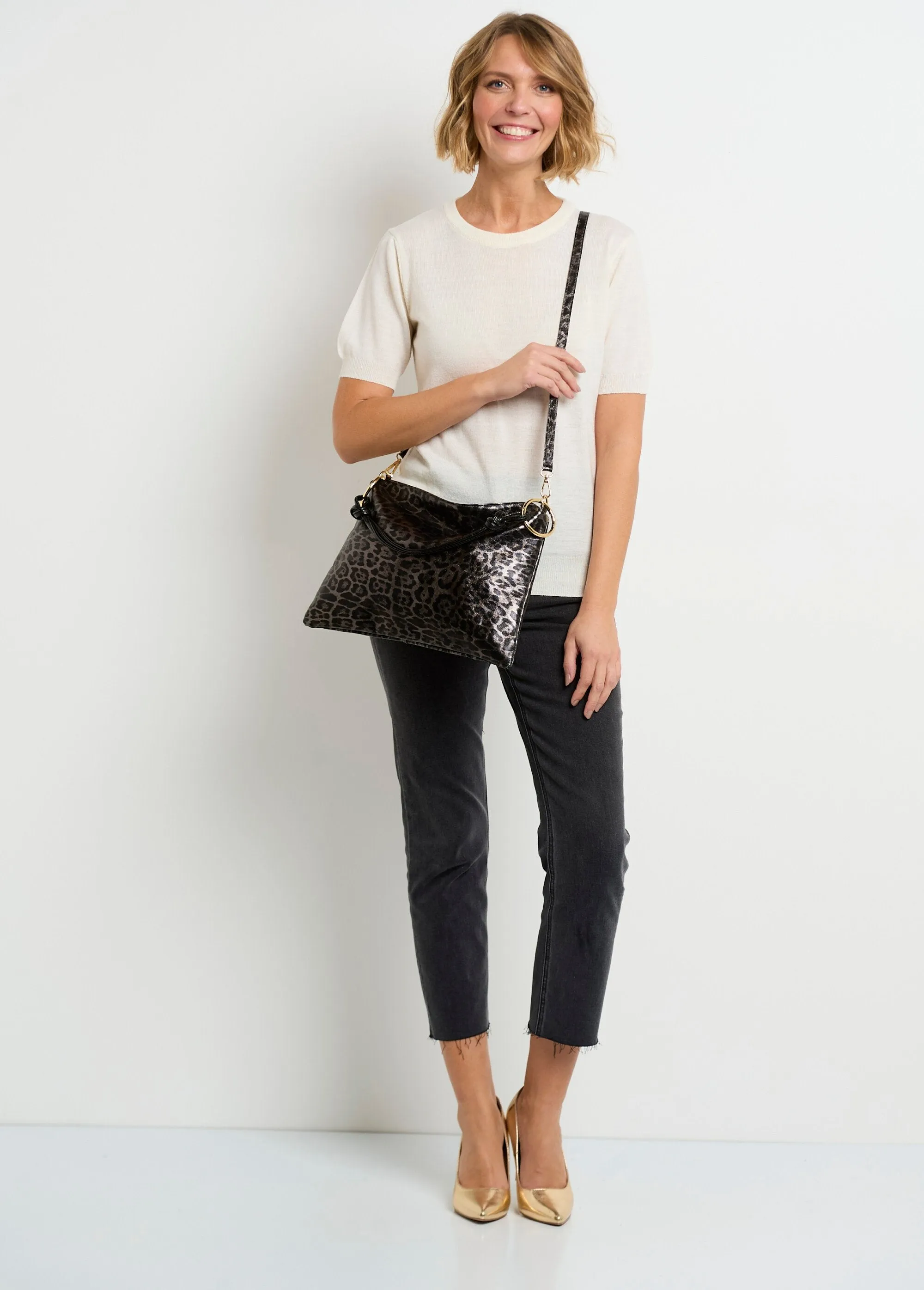 Shiny leopard print leather handbag