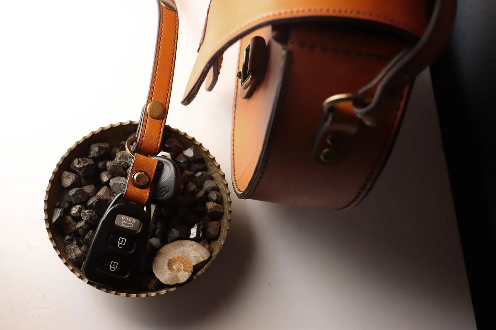 Sleek Cognac Bat Crossbody Handbag