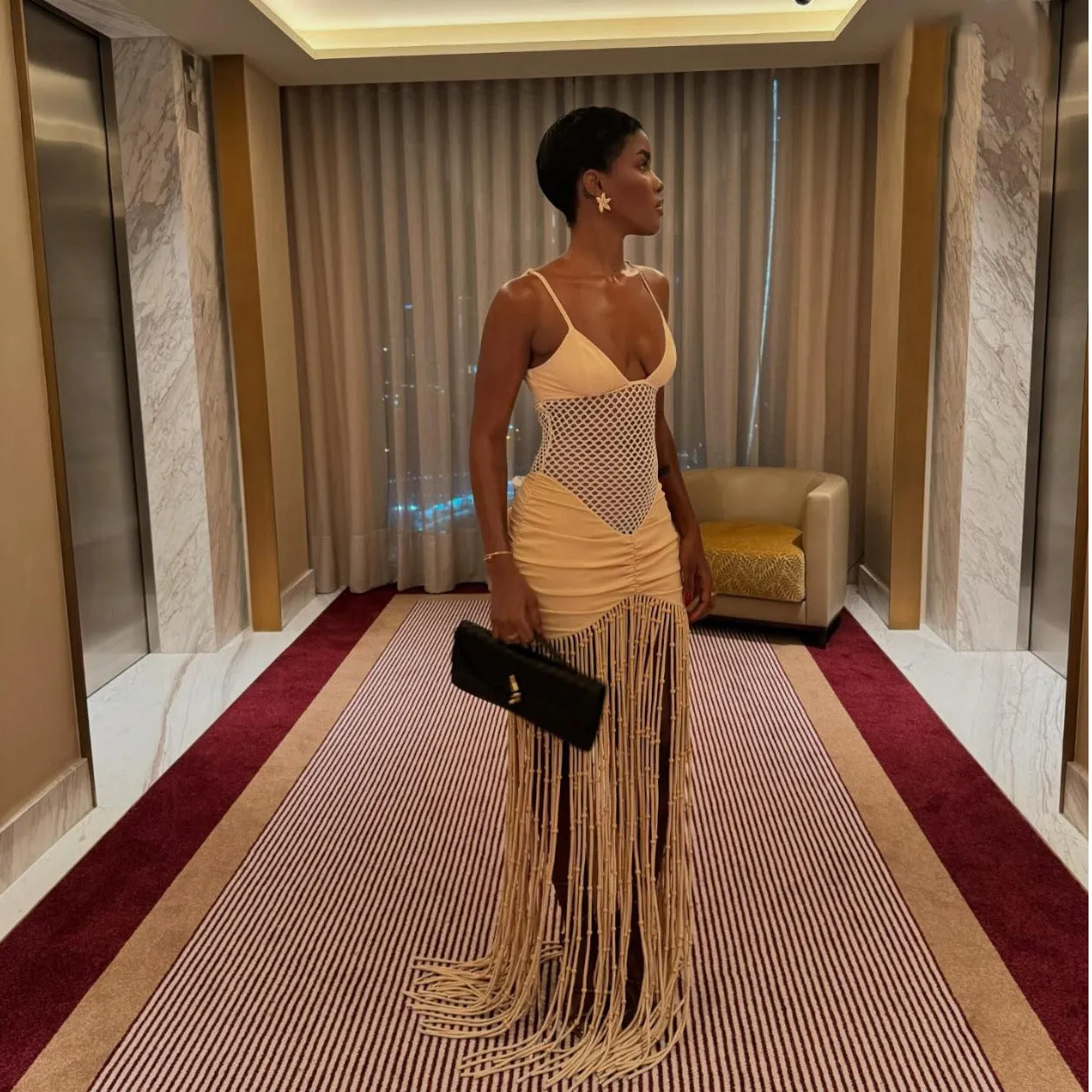 Sling mesh midriff-baring pleated butt-hugging fringed dress