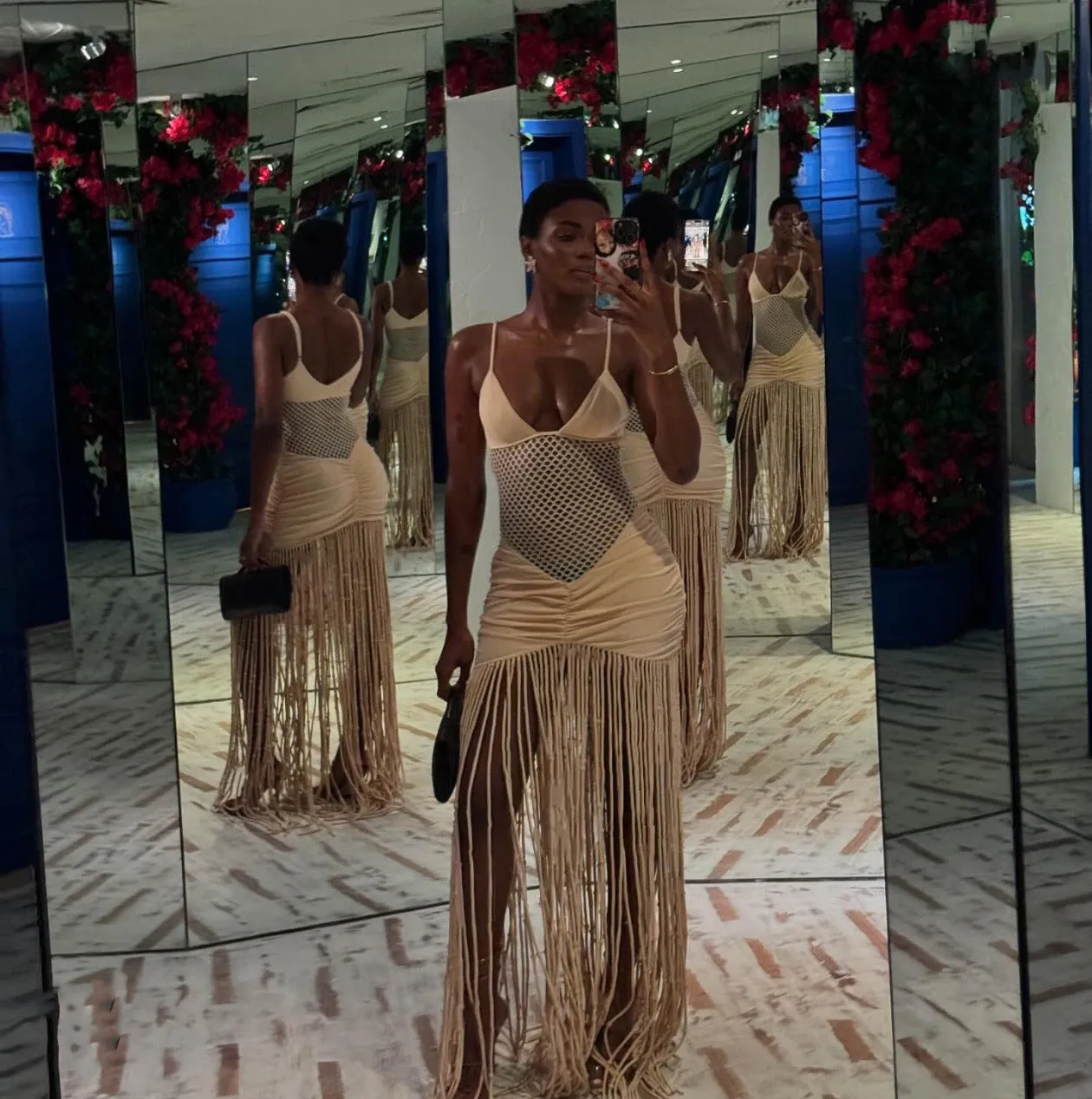 Sling mesh midriff-baring pleated butt-hugging fringed dress