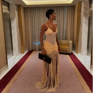 Sling mesh midriff-baring pleated butt-hugging fringed dress