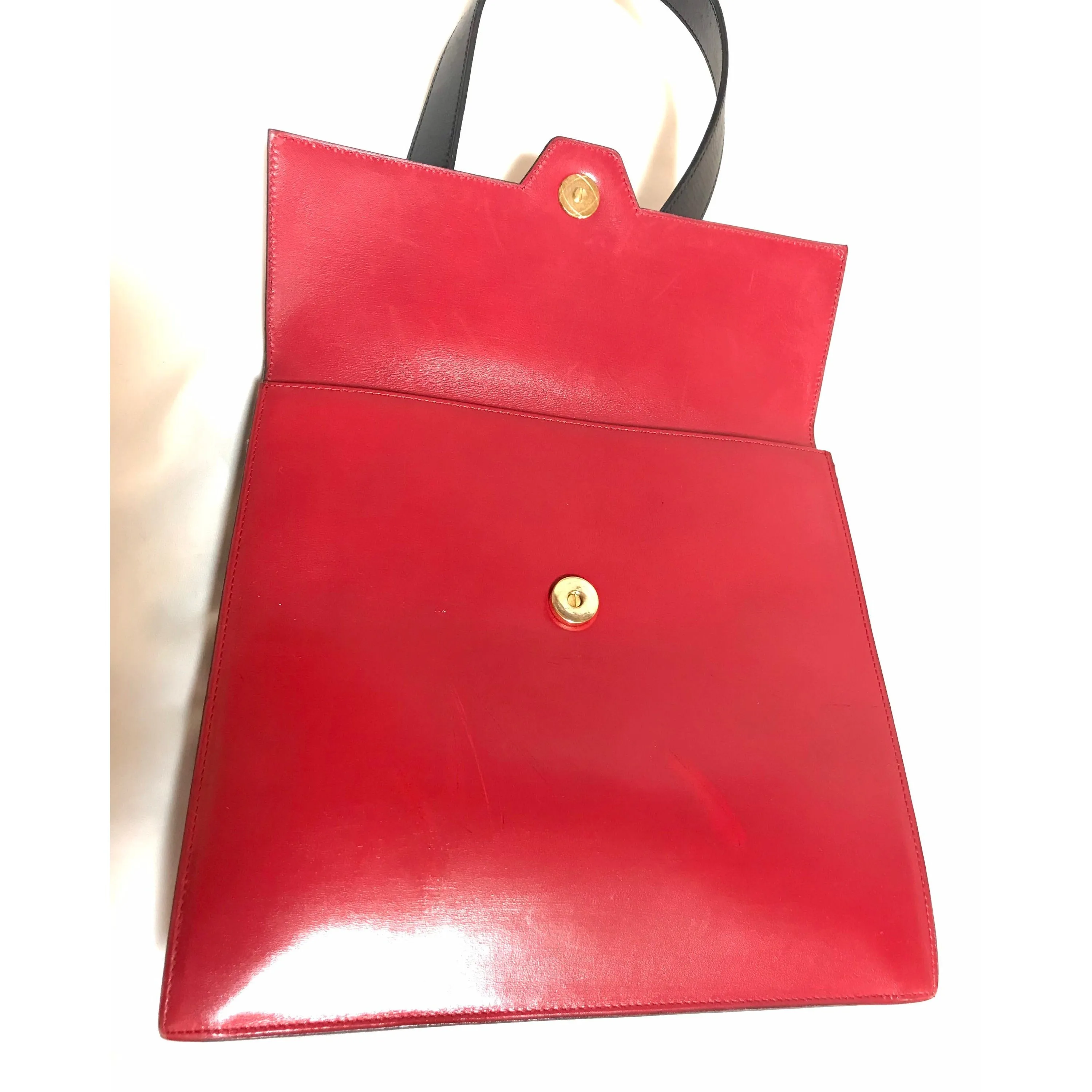 Vintage Karl Lagerfeld red and black double face shoulder bag with golden logo motifs. Rare unique bag. Must have.