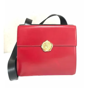 Vintage Karl Lagerfeld red and black double face shoulder bag with golden logo motifs. Rare unique bag. Must have.