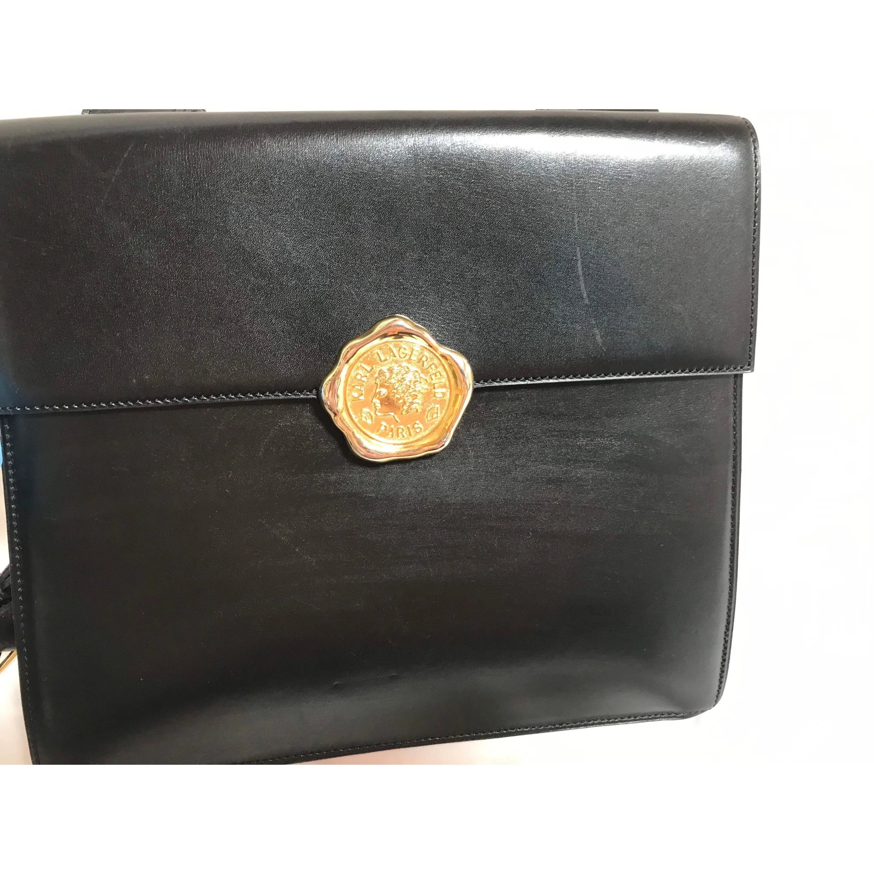 Vintage Karl Lagerfeld red and black double face shoulder bag with golden logo motifs. Rare unique bag. Must have.